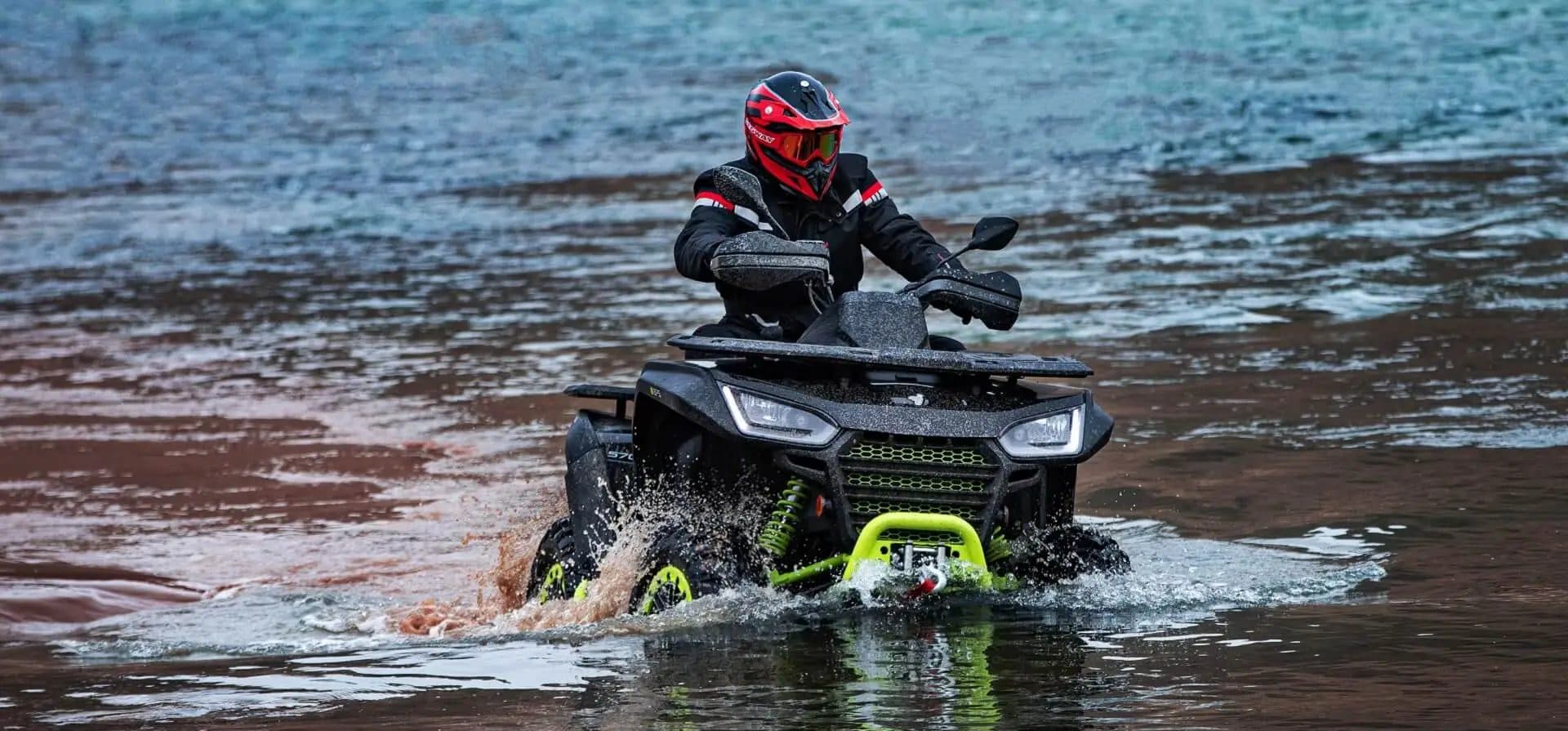 Segway Snarler AT5 splashing through a river