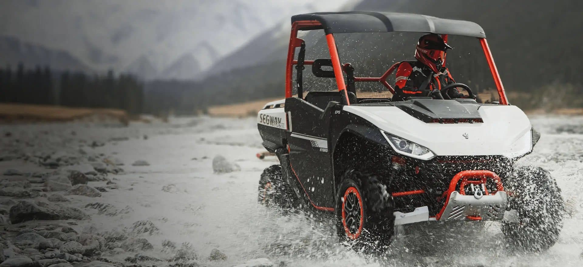 Segway Fugleman UT10 splashing through a mountain river