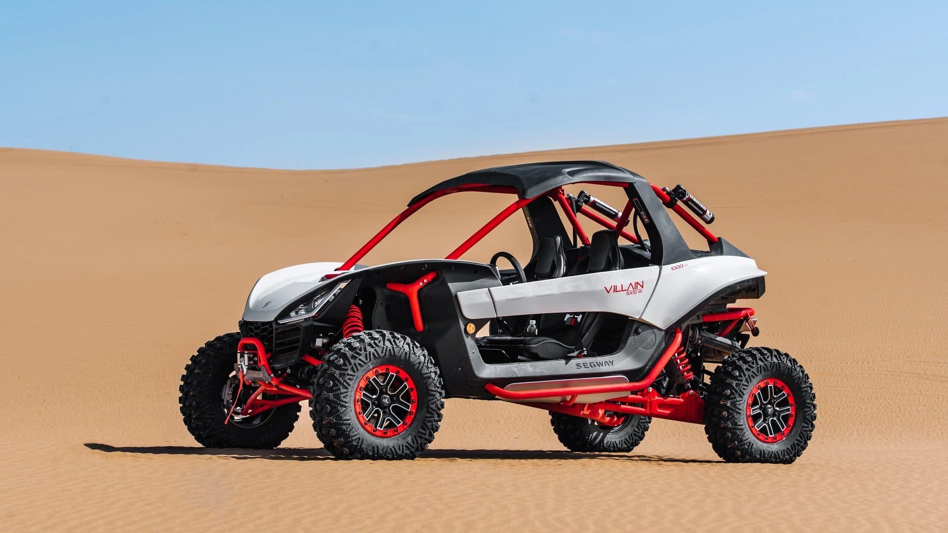 Segway Villain SX10 parked on a sand dune