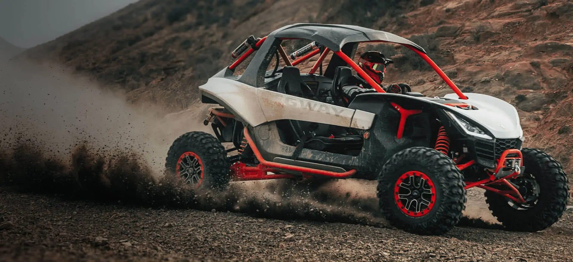 Segway Villain SX10 throwing dust on a dirt track