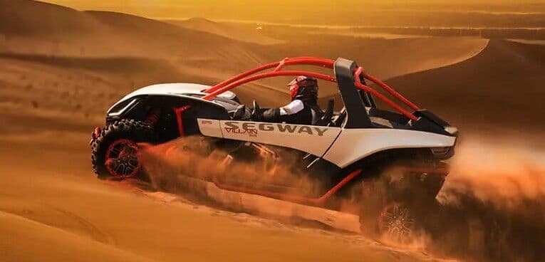 Segway Villain SX10 driving through sand